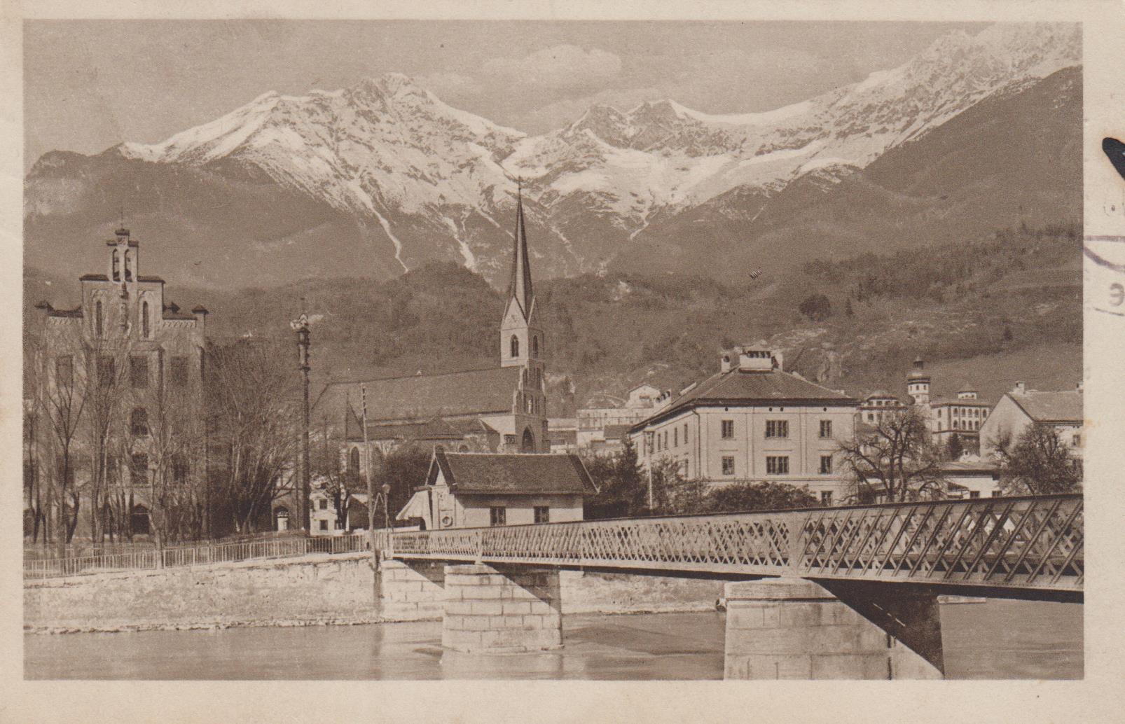 Der Innsteg,  heute Emile-Béthouart-Steg, mit der Knabenvolksschule St. Nikolaus (heute Landesberufsschule St. Nikolaus) und dem Ansitz Rauschenstein. Postkarte von 1918