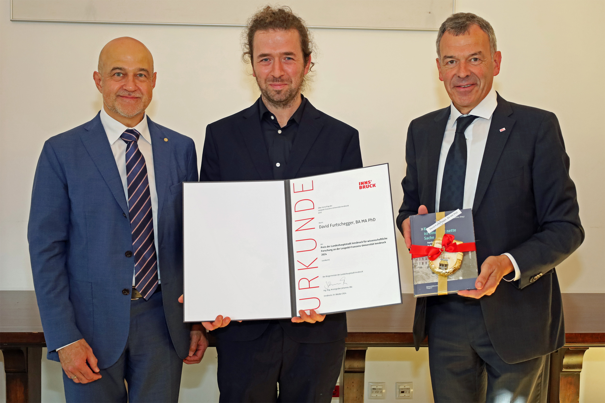 Preisträger David Furtschegger (M.).